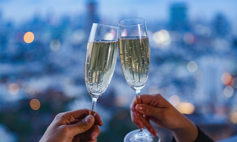 Couple toasting with champagne glasses during a romantic Las Vegas evening